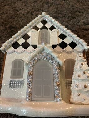 Mackenzie Childs - Illuminated Gingerbread house!  Beautiful decor table/mantle!